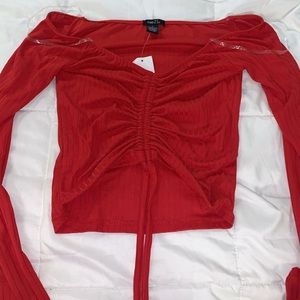 red off the shoulder shirt